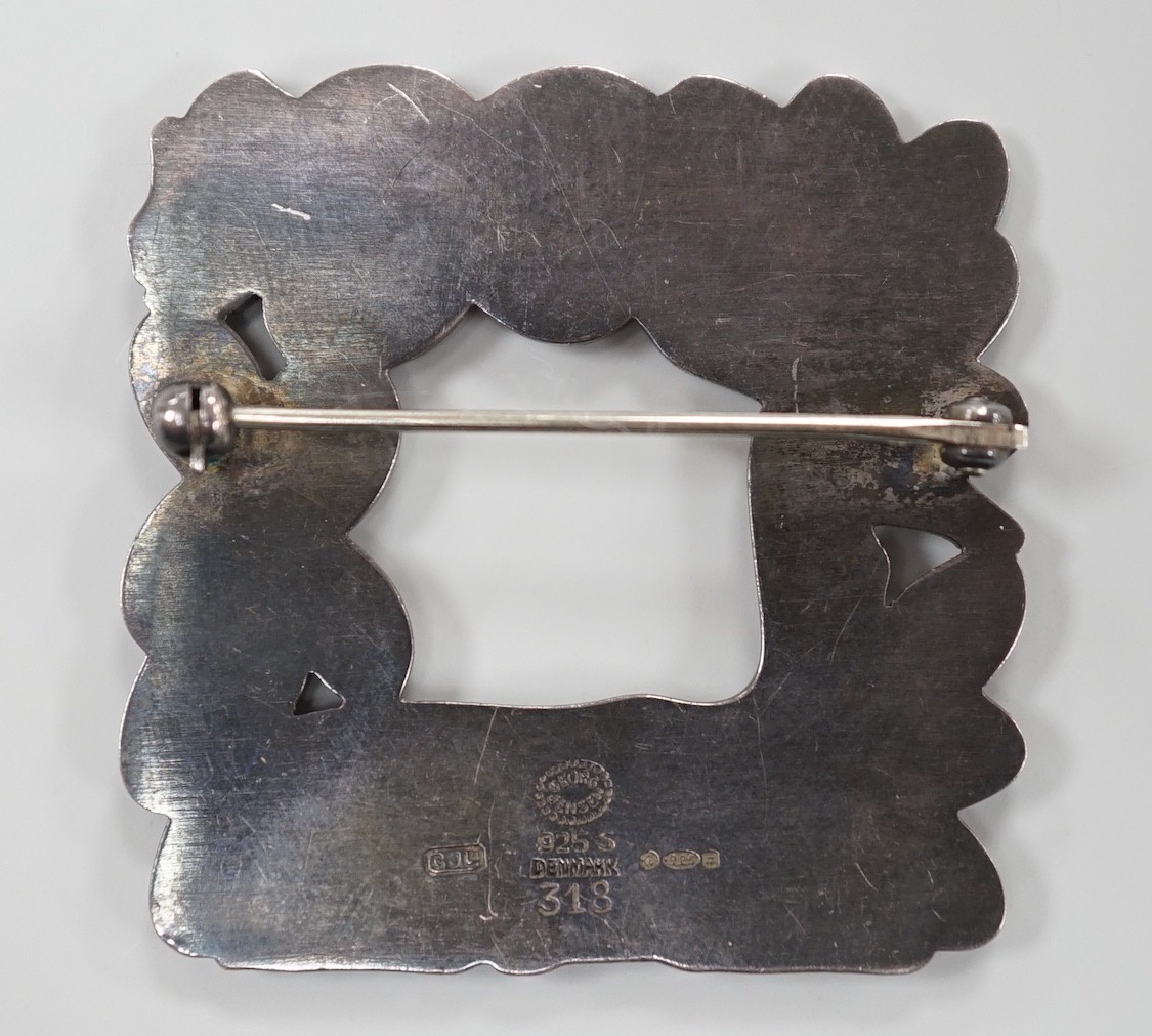 A 1960's Georg Jensen sterling 925 deer and squirrel square brooch, design no. 318, 40mm, with Jensen box.